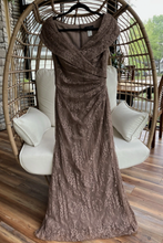 画像をギャラリービューアに読み込む, Brown lace dress hanging on a chair indoors
