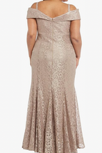 Laden Sie das Bild in den Galerie-Viewer, Woman wearing a beige off-shoulder lace dress on a white background