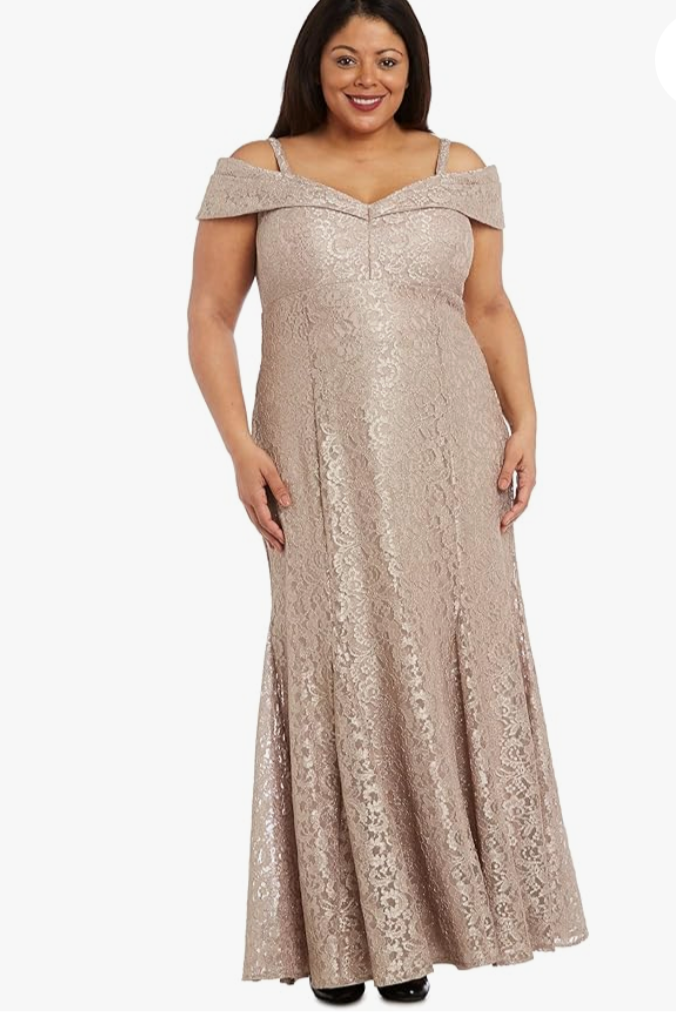 Woman wearing a beige off-shoulder lace dress on a white background