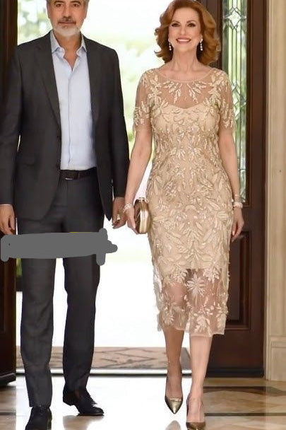 Man and woman holding hands in a formal setting